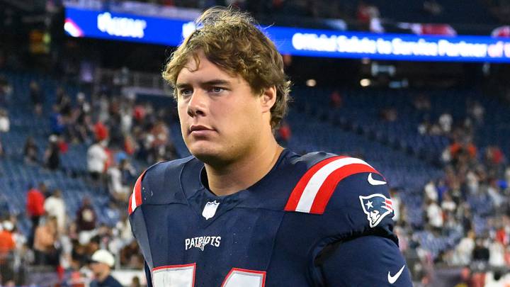 New England Patriots offensive tackle Caleb Lomu (74) leaves the field