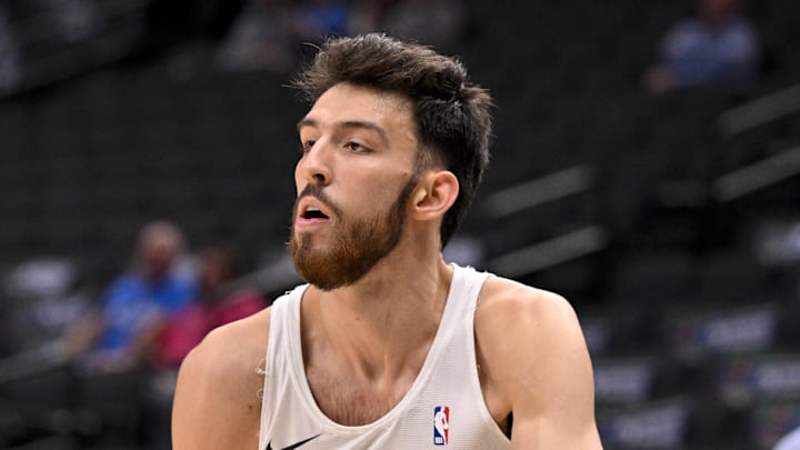 Oct 27, 2025; Dallas, Texas, USA; Oklahoma City Thunder center Chet Holmgren (7) warms up before the game against the Dallas Mavericks at the American Airlines Center. Mandatory Credit: Jerome Miron-Imagn Images