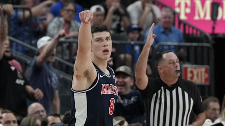 Nov 3, 2025; Las Vegas, NV, USA; Arizona Wildcats forward Ivan Kharchenkov (8) reacts after a 3-point basket against the Florida Gators in the first half of the Hall of Fame Series game at T-Mobile Arena. Mandatory Credit: Candice Ward-Imagn Images