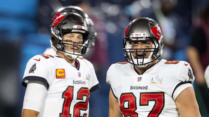 Tampa Bay Buccaneers running back Leonard Fournette with quarterback Tom Brady and tight end Rob Gronkowski.