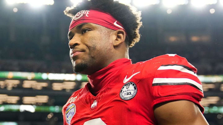 Ohio State Buckeyes defensive back Caleb Downs (2) leaves the field following the Cotton Bowl at AT&T Stadium in Arlington, Texas for the College Football Playoff quarterfinal game against the Miami Hurricanes on Dec. 31, 2025. Ohio State lost 24-14.
