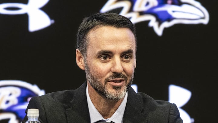 Jesse Minter smiling during opening remarks at press conference.