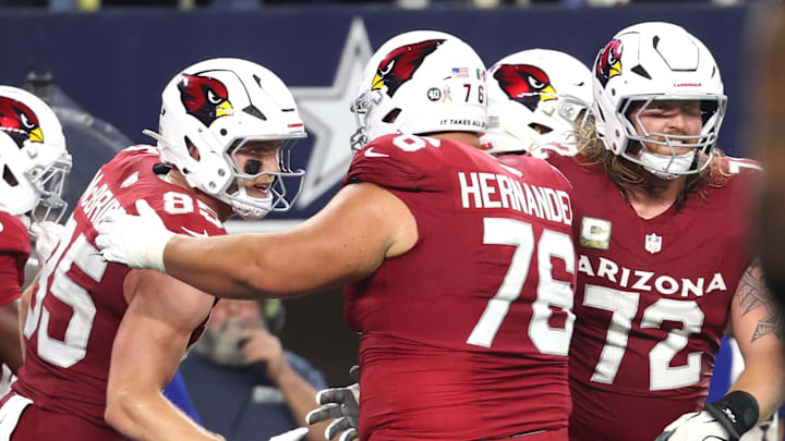 Nov 3, 2025; Arlington, Texas, USA;  Arizona Cardinals tight end Trey McBride (85) celebrates with guard Will Hernandez (76) after scoring a touchdown against the Dallas Cowboys in the second half at AT&T Stadium. Mandatory Credit: Kevin Jairaj-Imagn Images