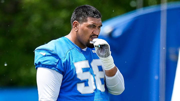 Detroit Lions offensive tackle Penei Sewell (58) watches practice during OTA at team's Performance Center Detroit Lions offensive tackle Penei Sewell (58) watches practice during OTA at team's Performance Center