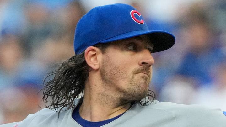 Aug 7, 2026; Kansas City, Missouri, USA; Chicago Cubs starting pitcher Kevin Gausman (12) delivers a pitch against the Kansas City Royals during the first inning at Kauffman Stadium. Mandatory Credit: Denny Medley-Imagn Images