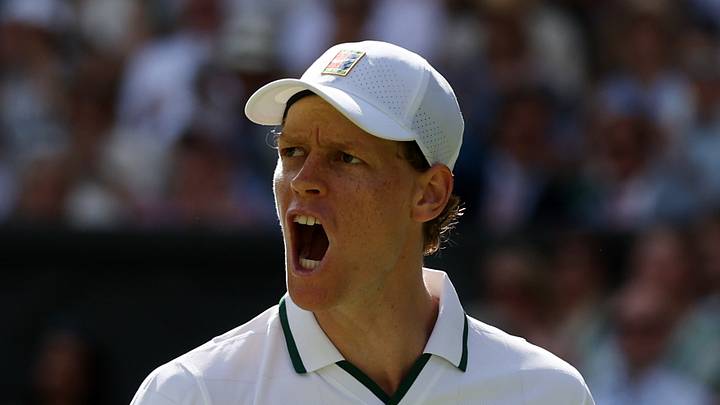 Jannik Sinner reacts after winning a point at Wimbledon