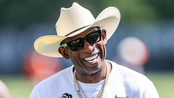 Jul 30, 2026; Berea, OH, USA; Cleveland Browns quarterback Shedeur Sanders (2) talks with his father Deion Sanders during training camp at CrossCountry Mortgage Campus. Mandatory Credit: Ken Blaze-Imagn Images