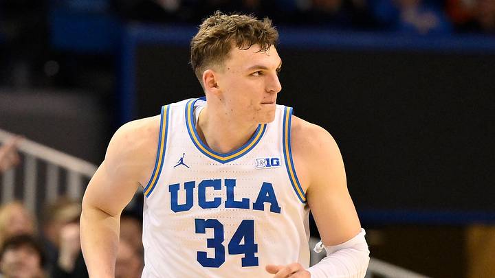 Feb 21, 2026; Los Angeles, California, USA; UCLA forward Tyler Bilodeau (34) runs back on defense after scoring a three-point basket during the second half against the Illinois Fighting Illini at Pauley Pavilion presented by Wescom Financial. Mandatory Credit: Robert Hanashiro-Imagn Images