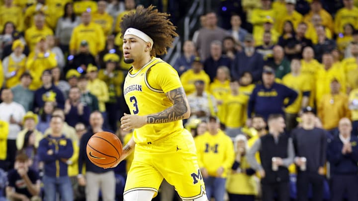 Feb 21, 2025; Ann Arbor, Michigan, USA; Michigan Wolverines guard Tre Donaldson (3) handles the ball during the first half of the game against the Michigan State Spartans at Crisler Center. Mandatory Credit: Brian Bradshaw Sevald-Imagn Images