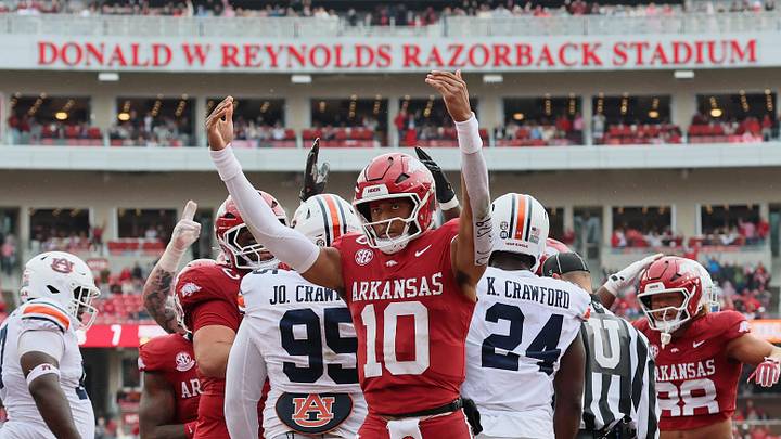 Arkansas Razorbacks quarterback Taylen Green (10) reacts after a touchdown scored by running back Braylen Russell (not pictured) against the Auburn Tigers during the second quarter at Razorback Stadium. Arkansas Razorbacks quarterback Taylen Green (10) reacts after a touchdown scored by running back Braylen Russell (not pictured) against the Auburn Tigers during the second quarter at Razorback Stadium.