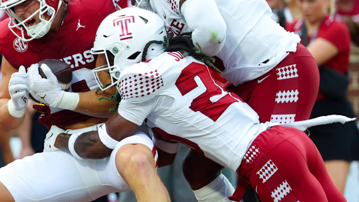 Aug 30, 2024; Norman, Oklahoma, USA; Oklahoma Sooners tight end Bauer Sharp (10) catches a touchdown pass past Temple Owls cornerback Jamel Johnson (20) and Temple Owls linebacker D.J. Woodbury Sr. (0) during the first quarter  at Gaylord Family-Oklahoma Memorial Stadium. Mandatory Credit: Kevin Jairaj-Imagn Images