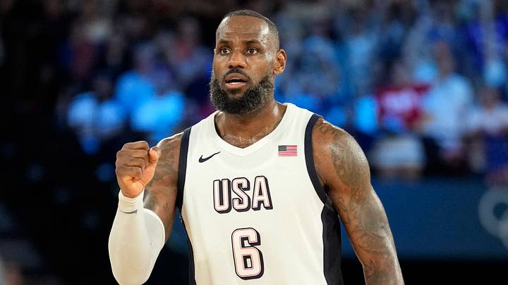 LeBron James (6) celebrates during the second half against Serbia in a men's basketball semifinal game during the Paris 2024 Olympic Summer Games at Accor Arena on Aug 8, 2024.