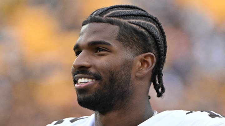 Oct 12, 2025; Pittsburgh, Pennsylvania, USA; Cleveland Browns quarterback Shedeur Sanders (12) watches the action against the Pittsburgh Steelers during the fourth quarter at Acrisure Stadium. 