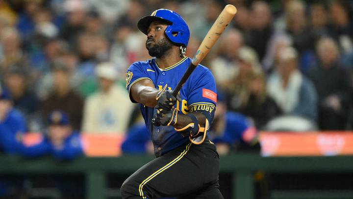 Sep 3, 2026; Seattle, Washington, USA; Seattle Mariners left fielder Randy Arozarena (56) hits a double against the Athletics during the sixth inning at T-Mobile Park. Mandatory Credit: Steven Bisig-Imagn Images