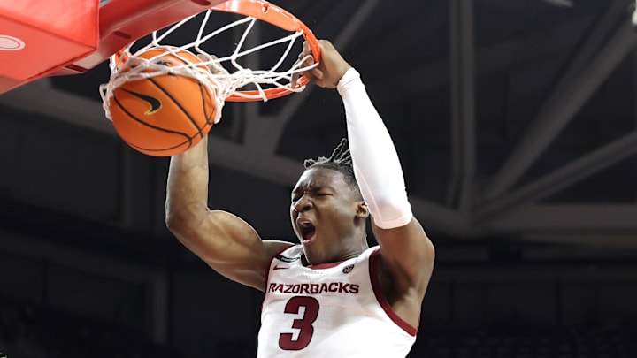 Arkansas Razorbacks forward Adou Thiero (3) dunks the ball in the second half as Pacific Tigers forward Elias Ralph (2) defends at Bud Walton Arena. Arkansas won 91-72. Arkansas Razorbacks forward Adou Thiero (3) dunks the ball in the second half as Pacific Tigers forward Elias Ralph (2) defends at Bud Walton Arena. Arkansas won 91-72.