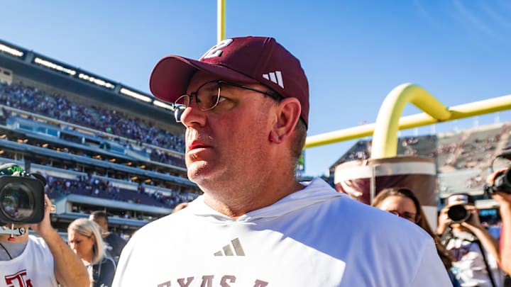 Nov 22, 2025; College Station, Texas, USA; Texas A&M Aggies head coach Mike Elko walks off the field after defeating the Samford Bulldogs 48-0 in a game at Kyle Field. Mandatory Credit: Joseph Buvid-Imagn Images