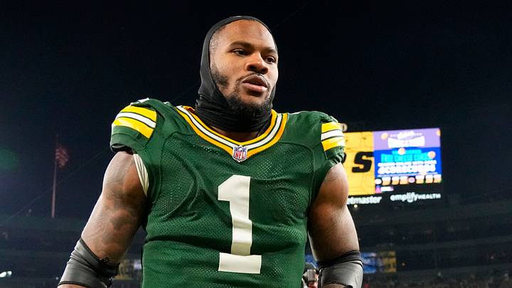 Green Bay Packers defensive end Micah Parsons (1) jogs off the field 