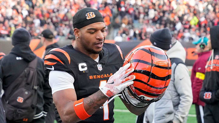 Cincinnati Bengals wide receiver Ja'marr Chase (1) pulls off his helmet at he returns to the sideline after a stalled drive in the fourth quarter of the NFL Week 18 game between the Cincinnati Bengals and the Cleveland Browns at Paycor Stadium in Downtown Cincinnati on Sunday, Jan. 4, 2026. The Browns kicked a last second field goal to win 20-18.