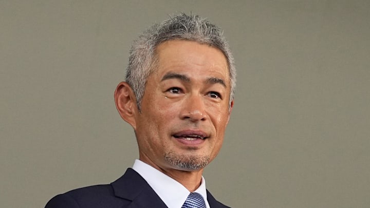 Hall of Fame inductee Ichiro Suzuki poses with his Hall of Fame plaque during a ceremony on July 27 in Cooperstown, N.Y.