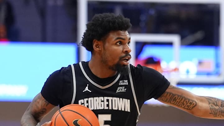 Jan 21, 2026; Villanova, Pennsylvania, USA; Georgetown Hoyas guard KJ Lewis (5) controls the ball against the Villanova Wildcats in the second half at William B. Finneran Pavilion. Mandatory Credit: Kyle Ross-Imagn Images