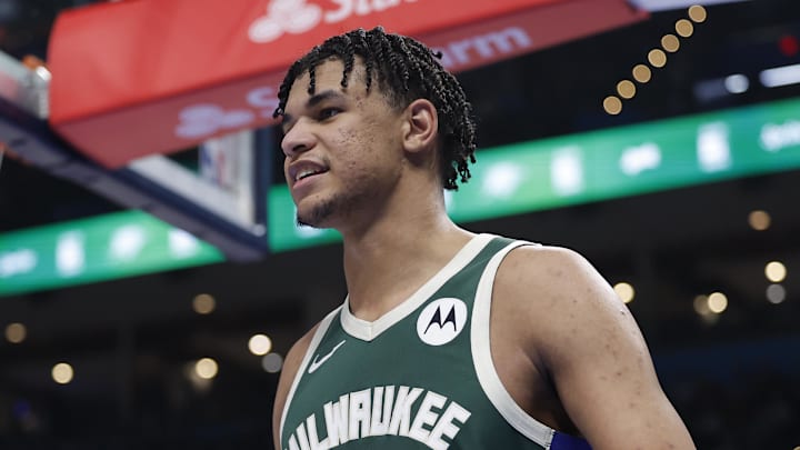 Milwaukee Bucks forward Ousmane Dieng (21) smiles after a play against the Oklahoma City Thunder during the second half at Paycom Center on February 12, 2026.