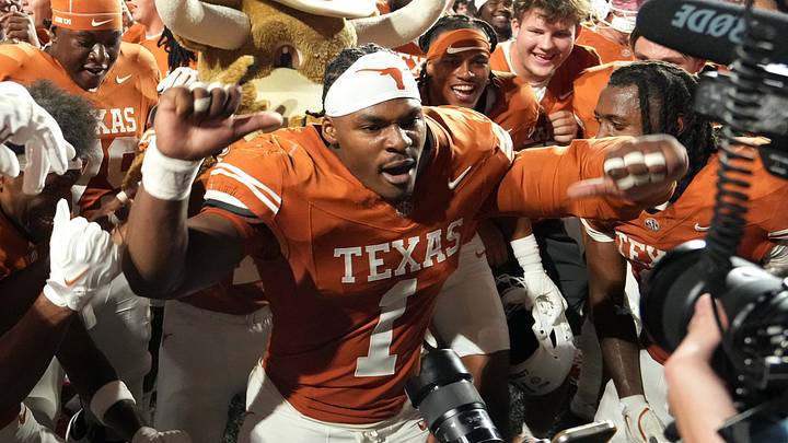 Texas Longhorns defensive end Colin Simmons (1) celebrates with teammates after defeating the against the Ohio State Buckeyes at Darrell K Royal-Texas Memorial Stadium. Texas Longhorns defensive end Colin Simmons (1) celebrates with teammates after defeating the against the Ohio State Buckeyes at Darrell K Royal-Texas Memorial Stadium.
