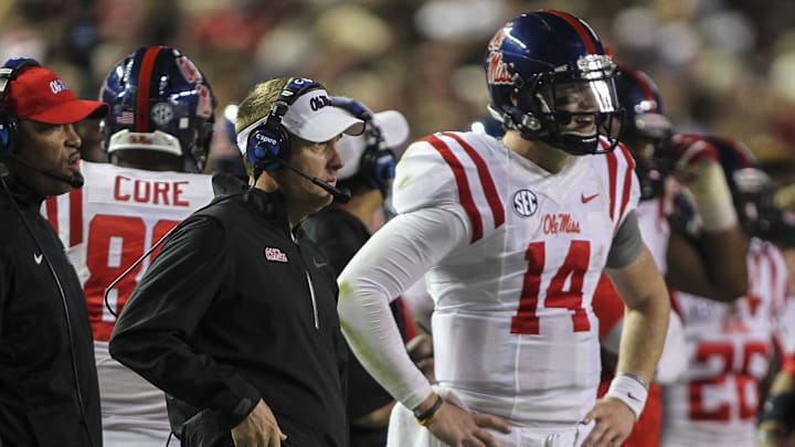 Bo Wallace played quarterback at Ole Miss for current Auburn Tigers head coach Hugh Freeze from 2012-14. Bo Wallace played quarterback at Ole Miss for current Auburn Tigers head coach Hugh Freeze from 2012-14.