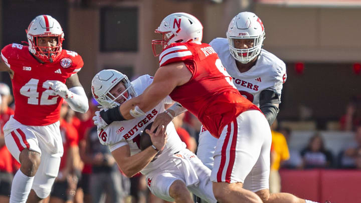 Nebraska defensive lineman Ty Robinson sacks Rutgers quarterback Athan Kaliakmanis for a 9-yard loss. Nebraska defensive lineman Ty Robinson sacks Rutgers quarterback Athan Kaliakmanis for a 9-yard loss.