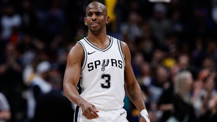 Apr 2, 2025; Denver, Colorado, USA; San Antonio Spurs guard Chris Paul (3) in the first quarter against the Denver Nuggets at Ball Arena.