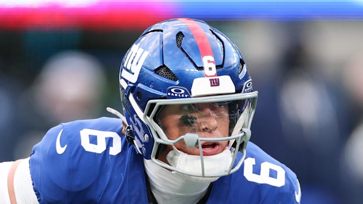 New York Giants quarterback Jaxson Dart scrambles during the fourth quarter against the Dallas Cowboys.