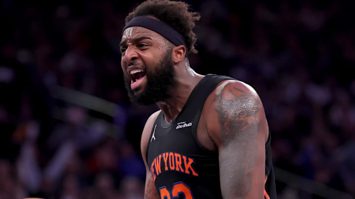 Dec 19, 2025; New York, New York, USA; New York Knicks center Mitchell Robinson (23) reacts after a dunk against the Philadelphia 76ers during the second quarter at Madison Square Garden. Mandatory Credit: Brad Penner-Imagn Images