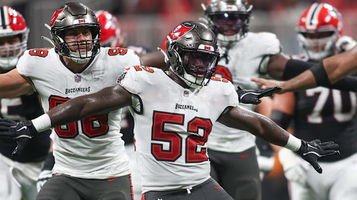 Oct 3, 2024; Atlanta, Georgia, USA; Tampa Bay Buccaneers linebacker K.J. Britt (52) and linebacker Anthony Nelson (98) and defensive tackle Vita Vea (50) react after a blocked field goal against the Atlanta Falcons in the fourth quarter at Mercedes-Benz Stadium. Mandatory Credit: Brett Davis-Imagn Images Oct 3, 2024; Atlanta, Georgia, USA; Tampa Bay Buccaneers linebacker K.J. Britt (52) and linebacker Anthony Nelson (98) and defensive tackle Vita Vea (50) react after a blocked field goal against the Atlanta Falcons in the fourth quarter at Mercedes-Benz Stadium. Mandatory Credit: Brett Davis-Imagn Images