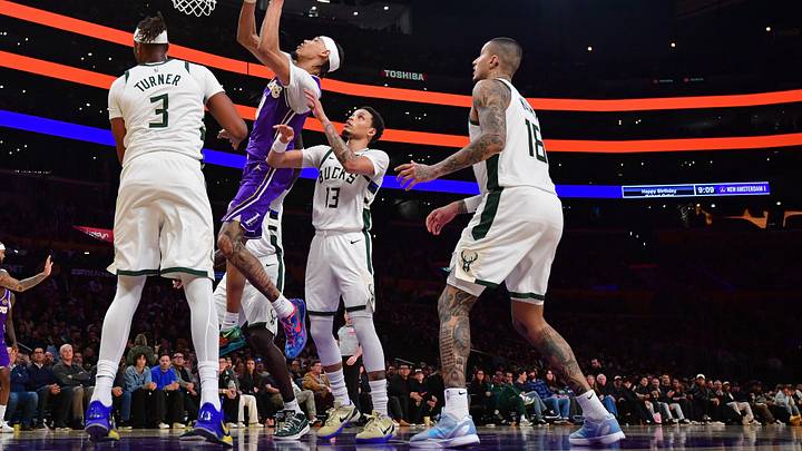 Jan 9, 2026; Los Angeles, California, USA; Los Angeles Lakers center Jaxson Hayes (11) moves to the basket against Milwaukee Bucks center Myles Turner (3) and guard Ryan Rollins (13) during the second half at Crypto.com Arena. Mandatory Credit: Gary A. Vasquez-Imagn Images Jan 9, 2026; Los Angeles, California, USA; Los Angeles Lakers center Jaxson Hayes (11) moves to the basket against Milwaukee Bucks center Myles Turner (3) and guard Ryan Rollins (13) during the second half at Crypto.com Arena. Mandatory Credit: Gary A. Vasquez-Imagn Images