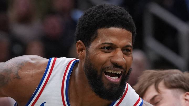 Apr 28, 2026; Boston, Massachusetts, USA; Philadelphia 76ers forward Paul George (8) drives the ball against Boston Celtics guard Baylor Scheierman (55) in the second quarter during game five of the first round of the 2026 NBA Playoffs at TD Garden. Mandatory Credit: David Butler II-Imagn Images