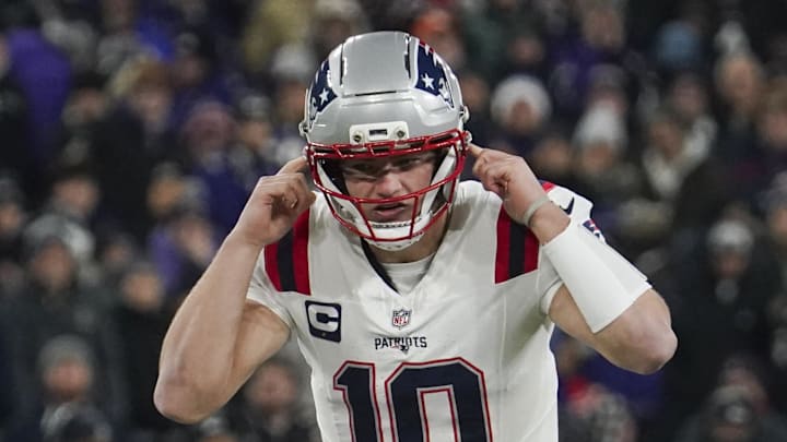 Dec 21, 2025; Baltimore, Maryland, USA;  New England Patriots quarterback Drake Maye (10) at the line of scrimmage against the Baltimore Ravens during the first quarter of the game at M&T Bank Stadium. Mandatory Credit: James Lang-Imagn Images