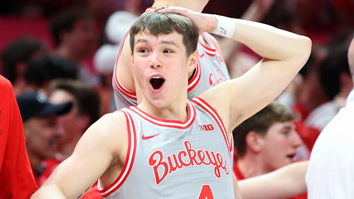 Mar 7, 2026; Columbus, Ohio, USA;  Ohio State Buckeyes guard Gabe Cupps (4) celebrates as time winds down during the second half against the Indiana Hoosiers at Value City Arena. Mandatory Credit: Joseph Maiorana-Imagn Images