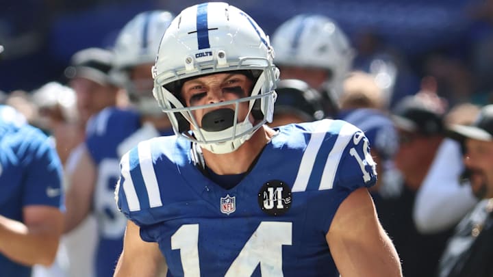 Sep 7, 2025; Indianapolis, Indiana, USA; Indianapolis Colts wide receiver Alec Pierce (14) celebrates after making a catch during the second half against the Miami Dolphins at Lucas Oil Stadium. Mandatory Credit: Trevor Ruszkowski-Imagn Images
