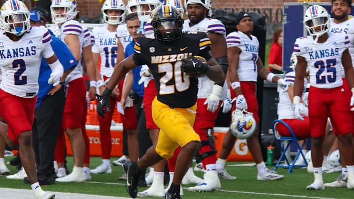 Sep 6, 2025; Columbia, Missouri, USA; Missouri Tigers running back Jamal Roberts runs the ball towards the end zone against Kansas. Sep 6, 2025; Columbia, Missouri, USA; Missouri Tigers running back Jamal Roberts runs the ball towards the end zone against Kansas.