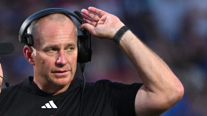Sep 20, 2025; Durham, North Carolina, USA; NC State Wolfpack head coach Dave Doeren reacts to a call during the fourth quarter against the Duke Blue Devils at Wallace Wade Stadium. Mandatory Credit: Zachary Taft-Imagn Images Sep 20, 2025; Durham, North Carolina, USA; NC State Wolfpack head coach Dave Doeren reacts to a call during the fourth quarter against the Duke Blue Devils at Wallace Wade Stadium. Mandatory Credit: Zachary Taft-Imagn Images