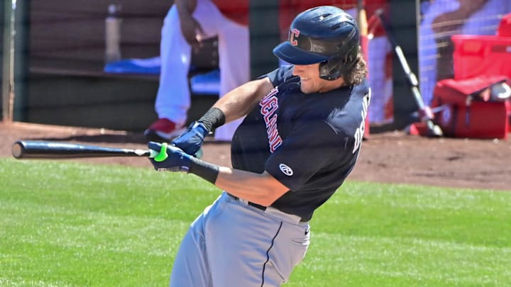 Feb 29, 2024; Tempe, Arizona, USA;  Cleveland Guardians right fielder Chase DeLauter (6)  grounds out in the third inning against the Los Angeles Angels during a spring training game at Tempe Diablo Stadium. Mandatory Credit: Matt Kartozian-Imagn Images