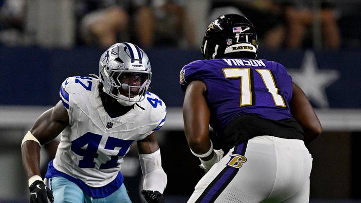 Dallas Cowboys linebacker Darius Harris (47) and Baltimore Ravens offensive tackle Carson Vinson (71)