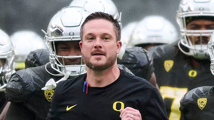 Nov 4, 2023; Eugene, Oregon, USA; Oregon Ducks head coach Dan Lanning runs out to the field with players before a game against the California Golden Bears at Autzen Stadium. Mandatory Credit: Troy Wayrynen-Imagn Images Nov 4, 2023; Eugene, Oregon, USA; Oregon Ducks head coach Dan Lanning runs out to the field with players before a game against the California Golden Bears at Autzen Stadium. Mandatory Credit: Troy Wayrynen-Imagn Images