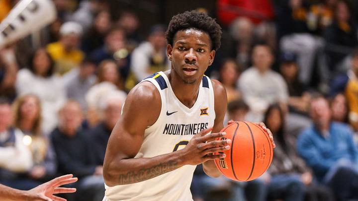 Nov 30, 2025; Morgantown, West Virginia, USA; West Virginia Mountaineers forward Brenen Lorient (0) looks to pass during the first half against the Mercyhurst Lakers at Hope Coliseum. Mandatory Credit: Ben Queen-Imagn Images