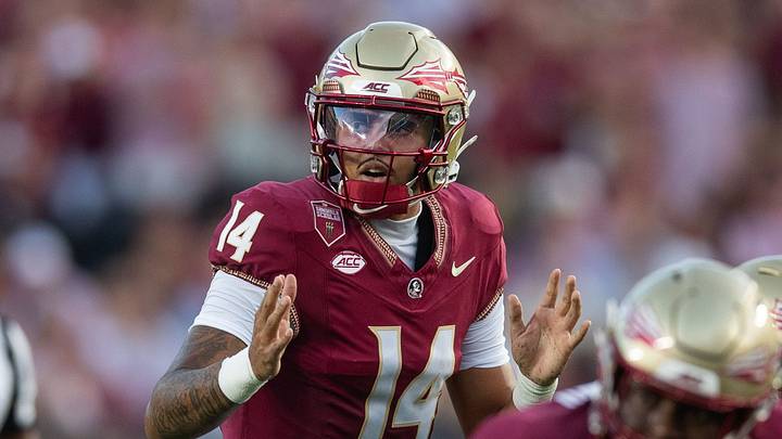 Florida State Seminoles quarterback Ashton Daniels (14) calls a play before the snap. The Florida State Seminoles lead the New Mexico State Aggies 17-7 at the half on Saturday, Aug. 29, 2026. Florida State Seminoles quarterback Ashton Daniels (14) calls a play before the snap. The Florida State Seminoles lead the New Mexico State Aggies 17-7 at the half on Saturday, Aug. 29, 2026.