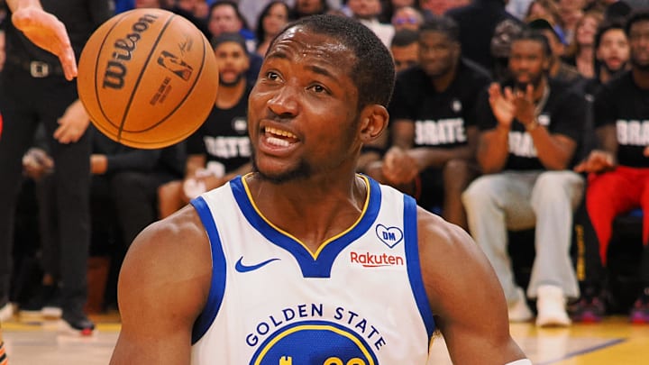 Jan 24, 2024; San Francisco, California, USA; Golden State Warriors forward Jonathan Kuminga (00) reacts after a play against the Atlanta Hawks during the third quarter at Chase Center. Mandatory Credit: Kelley L Cox-Imagn Images
