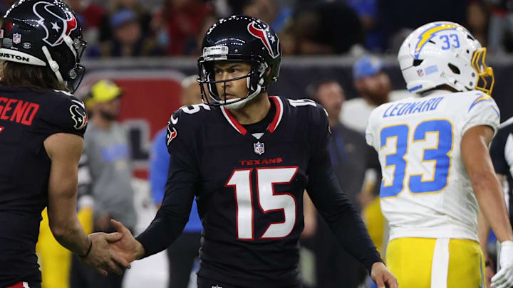 Jan 11, 2025; Houston, Texas, USA;  Houston Texans punter Ka'imi Fairbairn (15) celebrates a field goal with punter Tommy Townsend (6) against the Los Angeles Chargers in the third quarter in an AFC wild card game at NRG Stadium. Mandatory Credit: Thomas Shea-Imagn Images