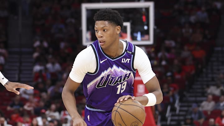 Oct 8, 2025; Houston, Texas, USA; /Utah Jazz forward Ace Bailey (19) dribbles the ball as Houston Rockets forward Jabari Smith Jr. (10) defends during the second quarter at Toyota Center. Mandatory Credit: Troy Taormina-Imagn Images