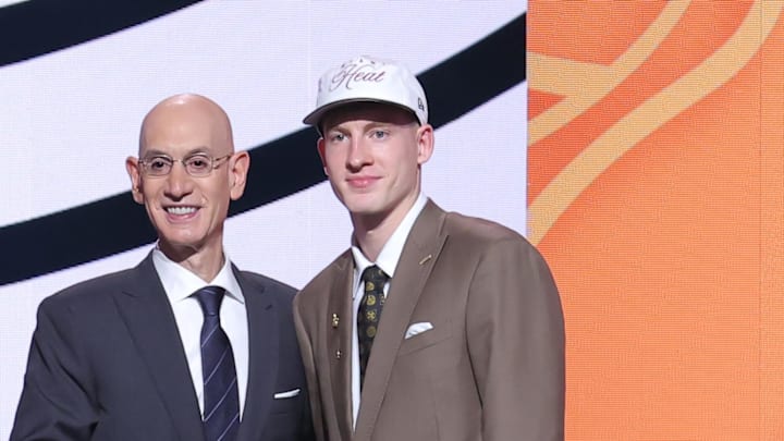 Jun 25, 2025; Brooklyn, NY, USA; Kasparas Jakucionis stands with NBA commissioner Adam Silver after being selected as the 20th pick by the Miami Heat in the first round of the 2025 NBA Draft at Barclays Center. Mandatory Credit: Brad Penner-Imagn Images Jun 25, 2025; Brooklyn, NY, USA; Kasparas Jakucionis stands with NBA commissioner Adam Silver after being selected as the 20th pick by the Miami Heat in the first round of the 2025 NBA Draft at Barclays Center. Mandatory Credit: Brad Penner-Imagn Images
