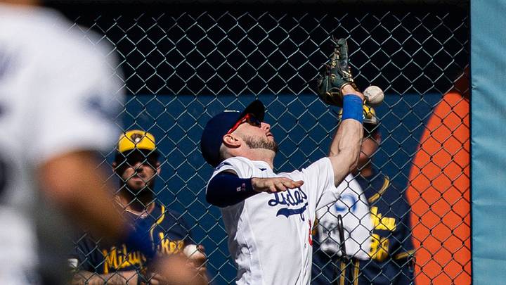 Aug 16, 2026; Los Angeles, California, USA; Los Angeles Dodgers right fielder Kyle Tucker (23) misses a fly ball in the ninth inning against the Milwaukee Brewers at Dodger Stadium. Mandatory Credit: Jon Endow-Imagn Images
