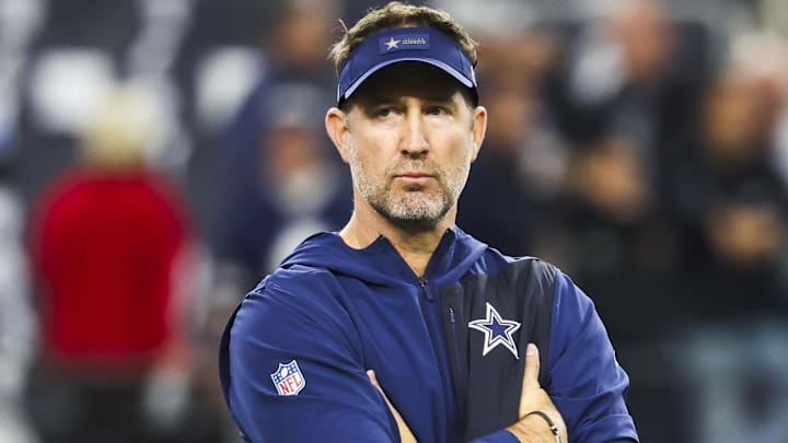 Dallas Cowboys head coach Brian Schottenheimer watches pregame warmups against the Los Angeles Chargers. Dallas Cowboys head coach Brian Schottenheimer watches pregame warmups against the Los Angeles Chargers.